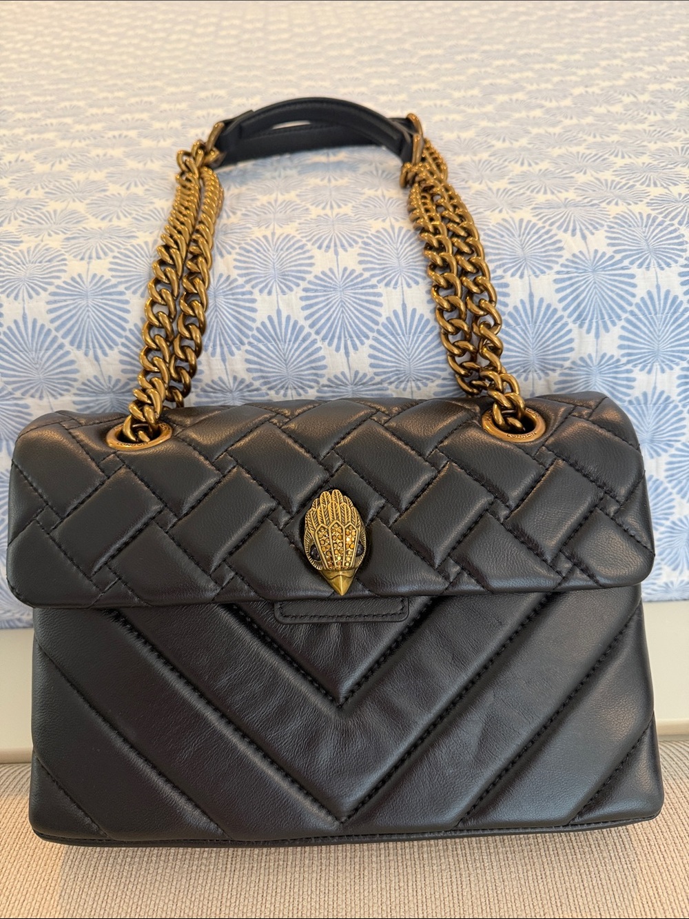Black Quilted Leather Shoulder Bag with Gold Chain Strap
